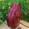 sac cœur l'Amoureuse de profil, cuir à tannage végétal pleine fleur, l'Âge du Cuir, maroquinerie artisanale, Dordogne, France