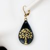 boucle d oreille arbre de vie sur gouttes d'eau noir or, tannage végétal, l'âge du cuir, maroquinerie artisanale éthique et responsable, dordogne, france