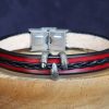 bracelet viking rouge noir griffe Surtslogi, tannage végétal, l'âge du cuir, maroquinerie artisanale éthique et responsable, Dordogne, France